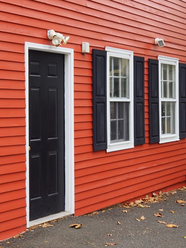 Red Vinyl Siding Installation